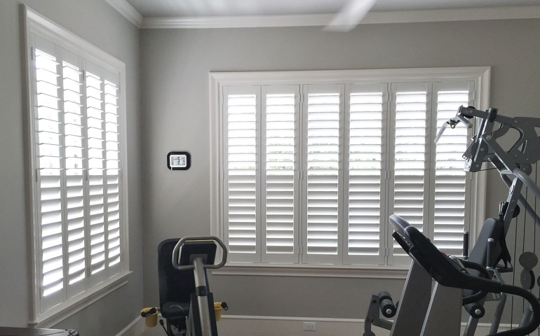 Philadelphia exercise room with shuttered windows.